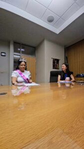 Tamara speaking with Mayor Lily Wu of Wichita about the importance of accessibility.